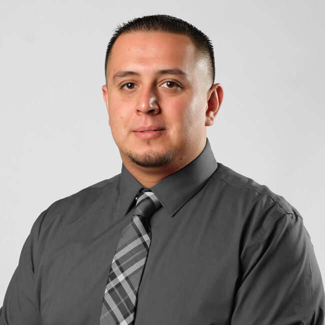Miguel – Headshot – Main – Charcoal Grey – Contact Photo – Tiny